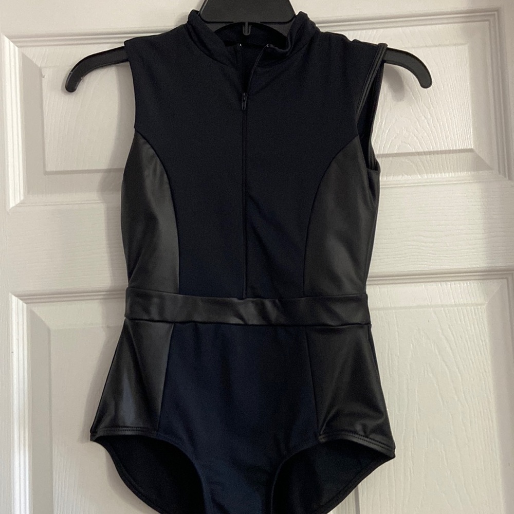 Black body suit/leotard. Pleather trim. Zip up neck.